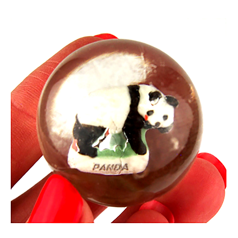 Sklenená gulička so zvieratkom