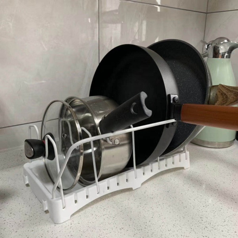 Nastaviteľný držiak na hrniec a pokrievku Veleka