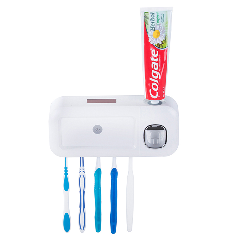 Držiak na zubné kefky s UV sterilizátorom a dávkovačom