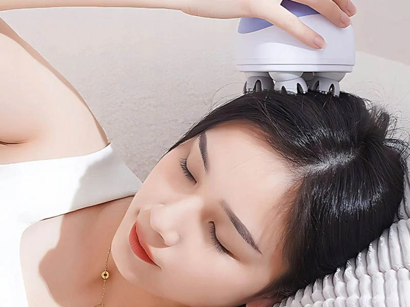 Masážny prístroj na hlavu