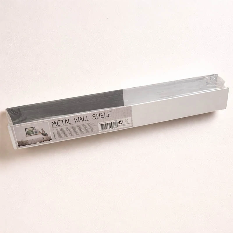 Kovová nástenná polica s magnetickými písmenami 45 × 7 × 4 cm biela