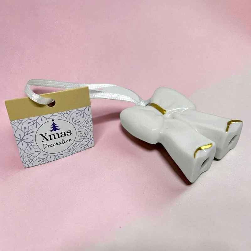 Porcelánová vianočná mašľa bielo-zlatá 6 cm