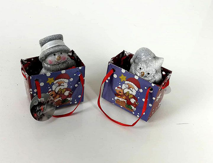 Vianočná postavička v darčekovej taške