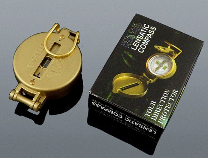 Kovový skladací kompas s lupou