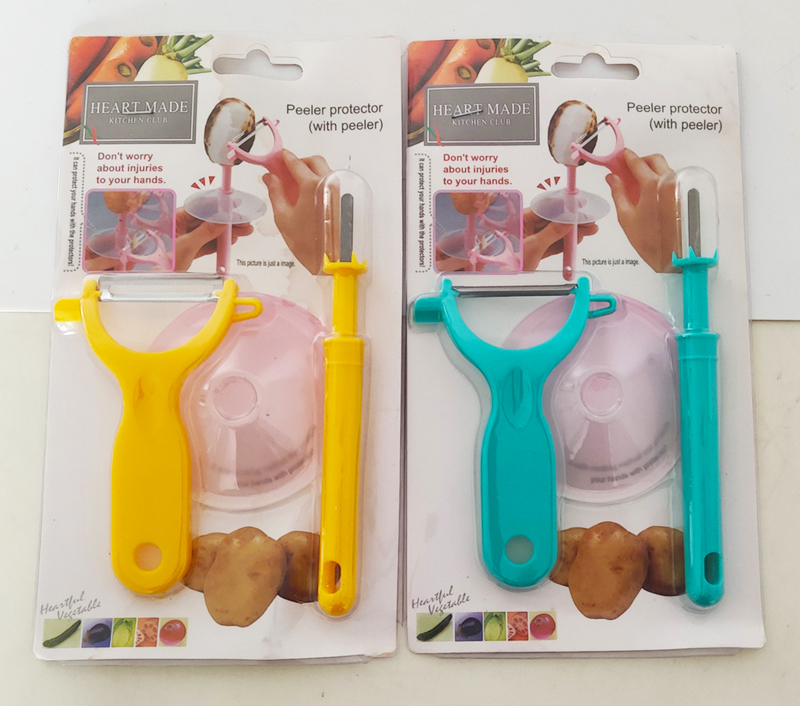 Škrabka na zeleninu s ochranou prstov