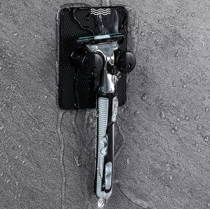 Držiak na holiaci strojček čierny