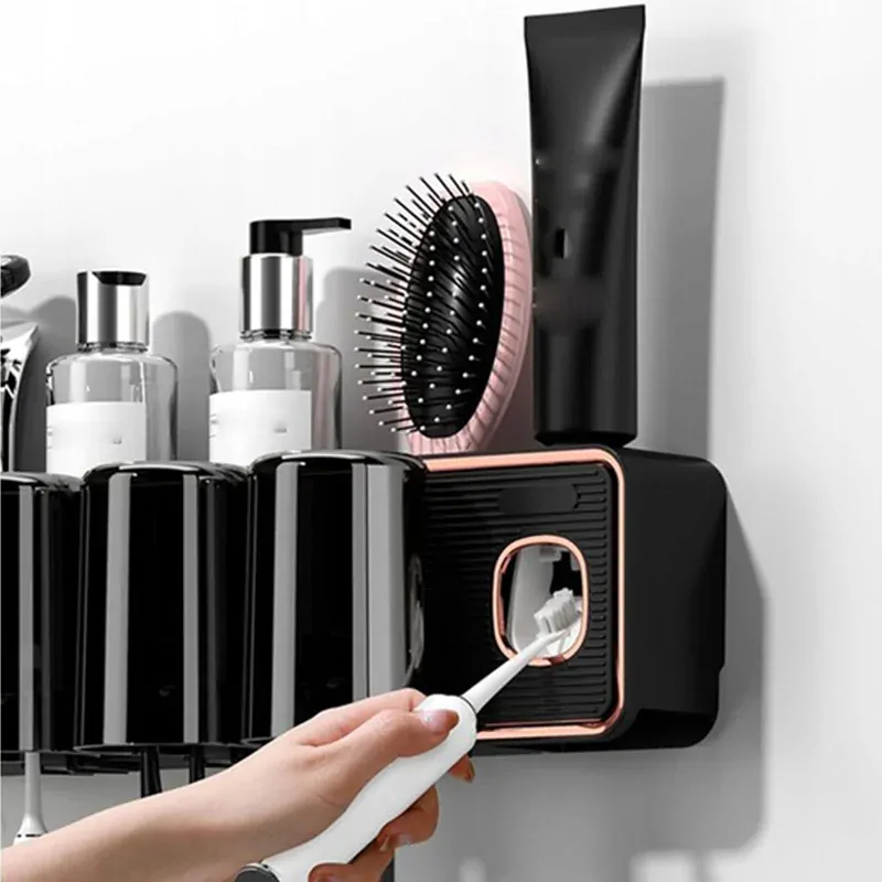 Držiak na zubné kefky s dávkovačom pasty a pohárikmi