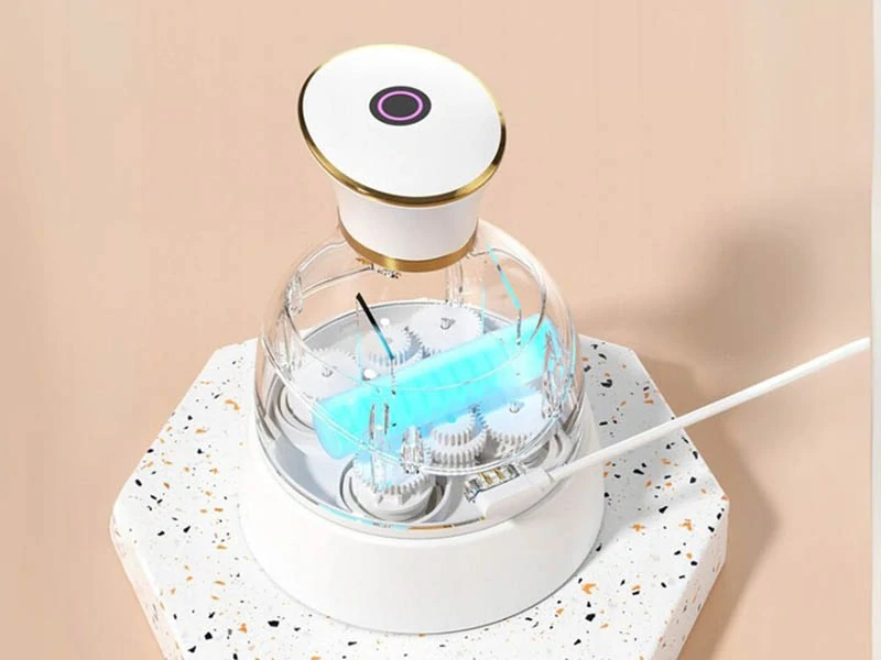 Masážny prístroj na hlavu