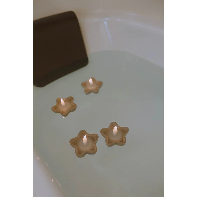 Plávajúce LED sviečky v tvare hviezdy – sada 4 ks