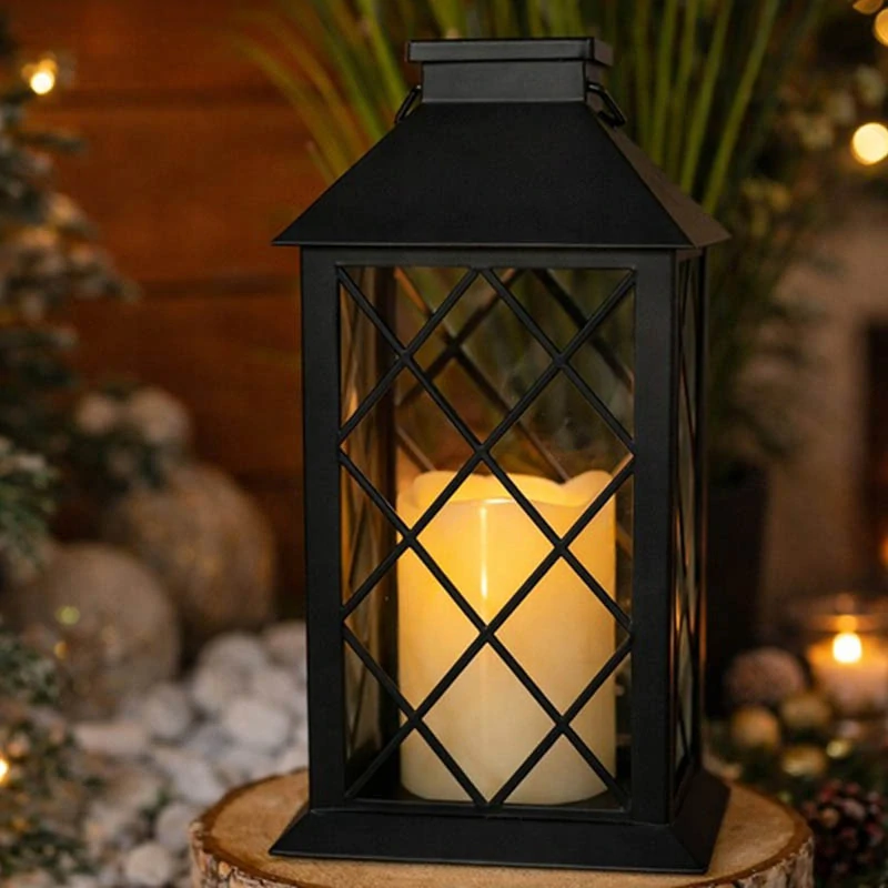 Dekoratívny solárny LED lampáš s elektrickou sviečkou čierny