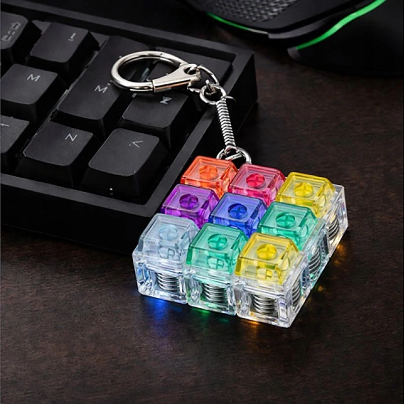 LED antistresový kliker s prepínačmi – fidget kľúčenka RGB