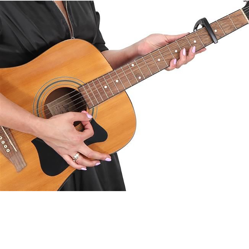 Kapodaster na gitary + 3 trsátka