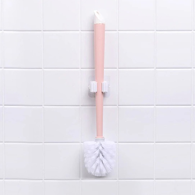 Univerzálny nástenný držak na upratovacie pomôcky