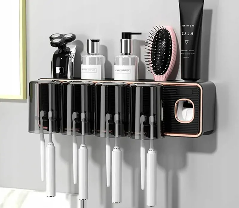 Držiak na zubné kefky s dávkovačom pasty a pohárikmi