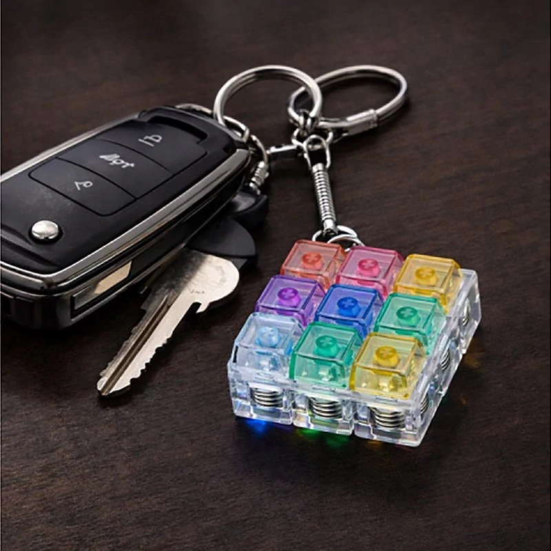 LED antistresový kliker s prepínačmi – fidget kľúčenka RGB