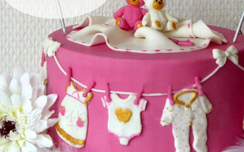 Silikónová forma na čokoládové figúrky Detské oblečenie 16x6cm