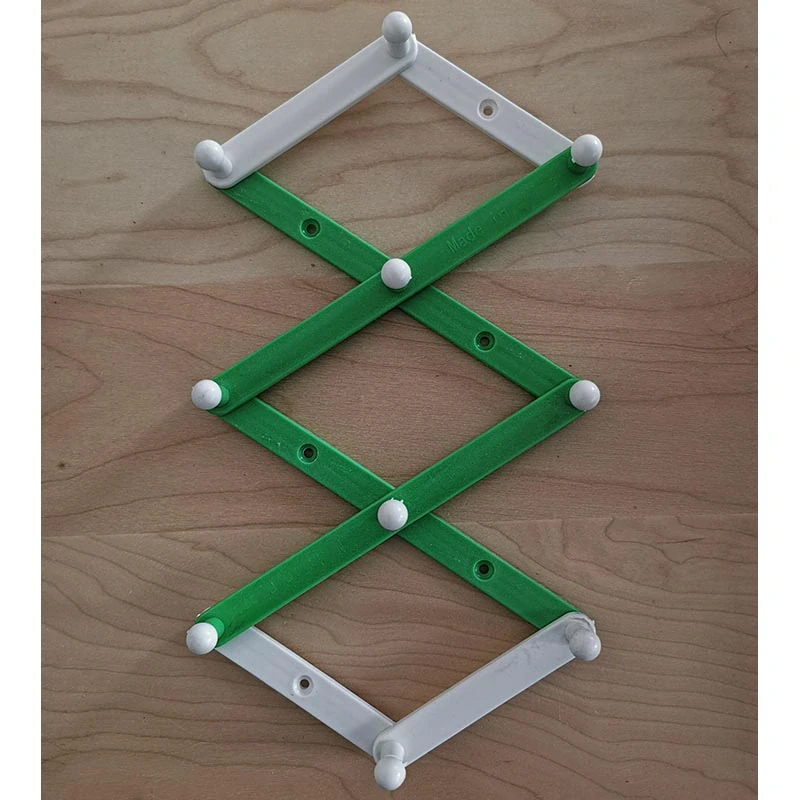 Skladací nástenný vešiak harmonika 18 cm bielo-zelený, rozsah 10 – 45 cm, 10 háčikov