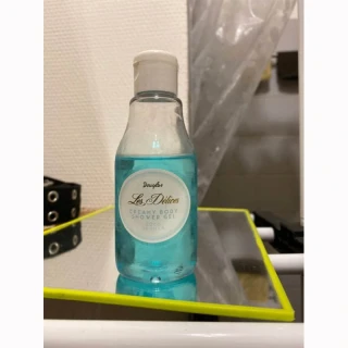 Krémový sprchový gél Les Délices kokos a vanilka 100 ml