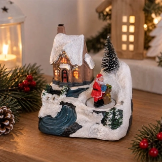 LED vianočná dedinka s domčekom a pohyblivým Santa Clausom 14 cm